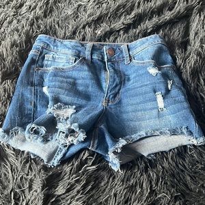 Ripped dark blue shorts
